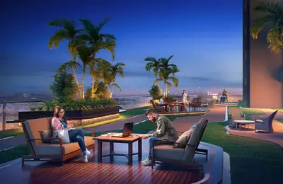 Landscaped terrace lounge with seating at dusk