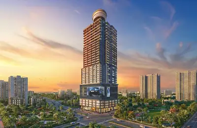 Platinum 9 World Tower at sunset, with the revolving deck at the crown of the tower